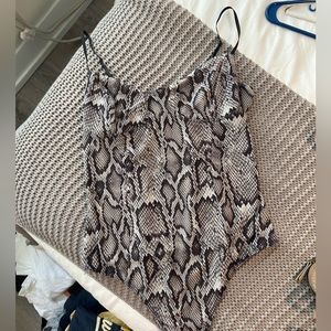 Snakeskin pattern body suit